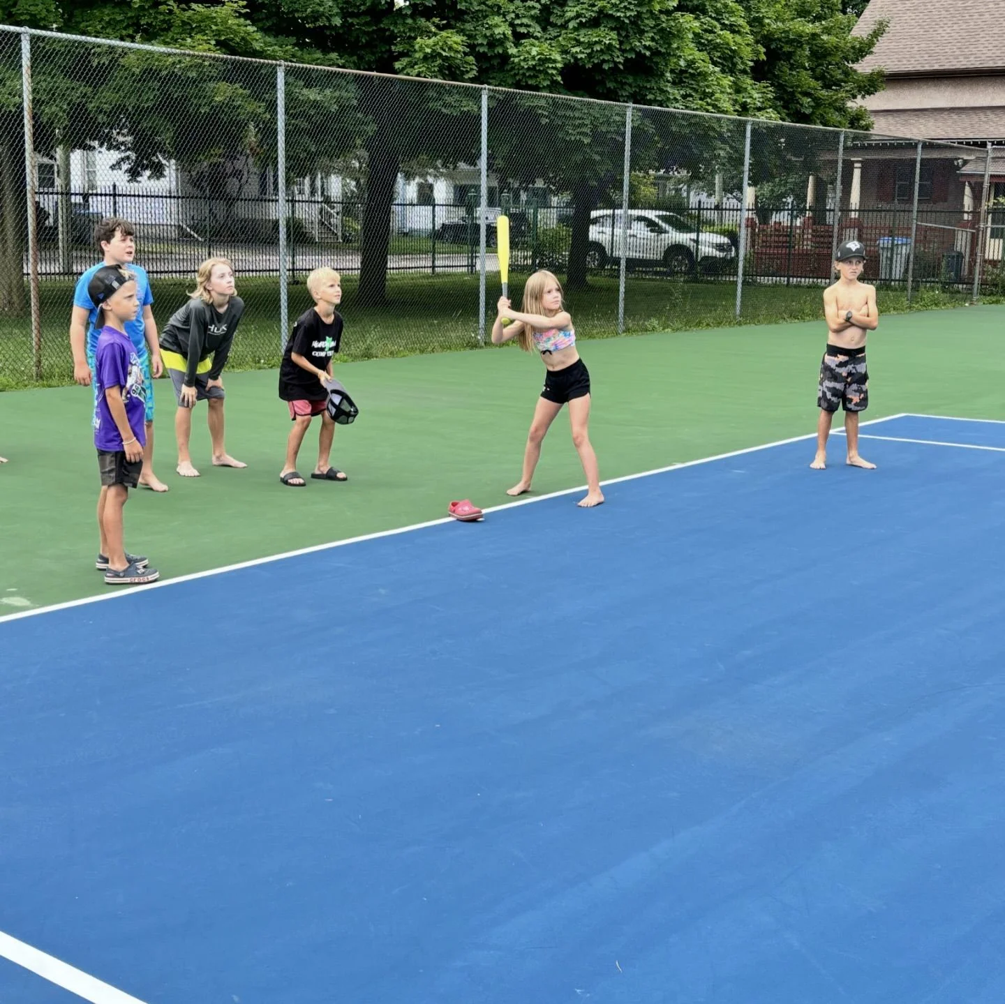 summer school program students playing baseball